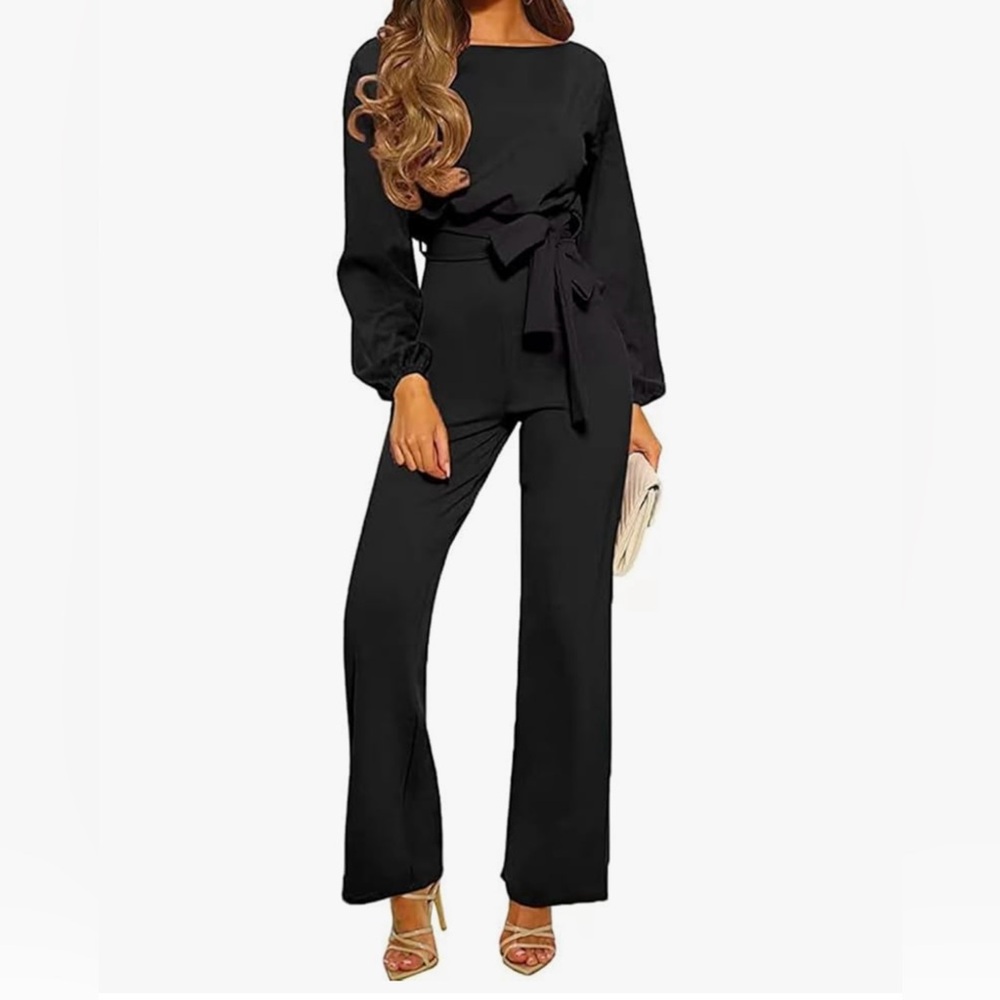 Women's size small formal jump suit. Button closure at the back. Flattering fit.